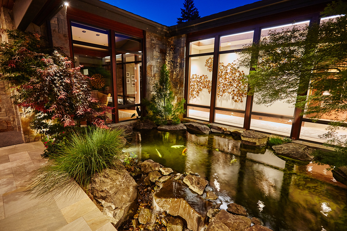 Dennis7Dees-Dream-Home_275 koi fish pond at night