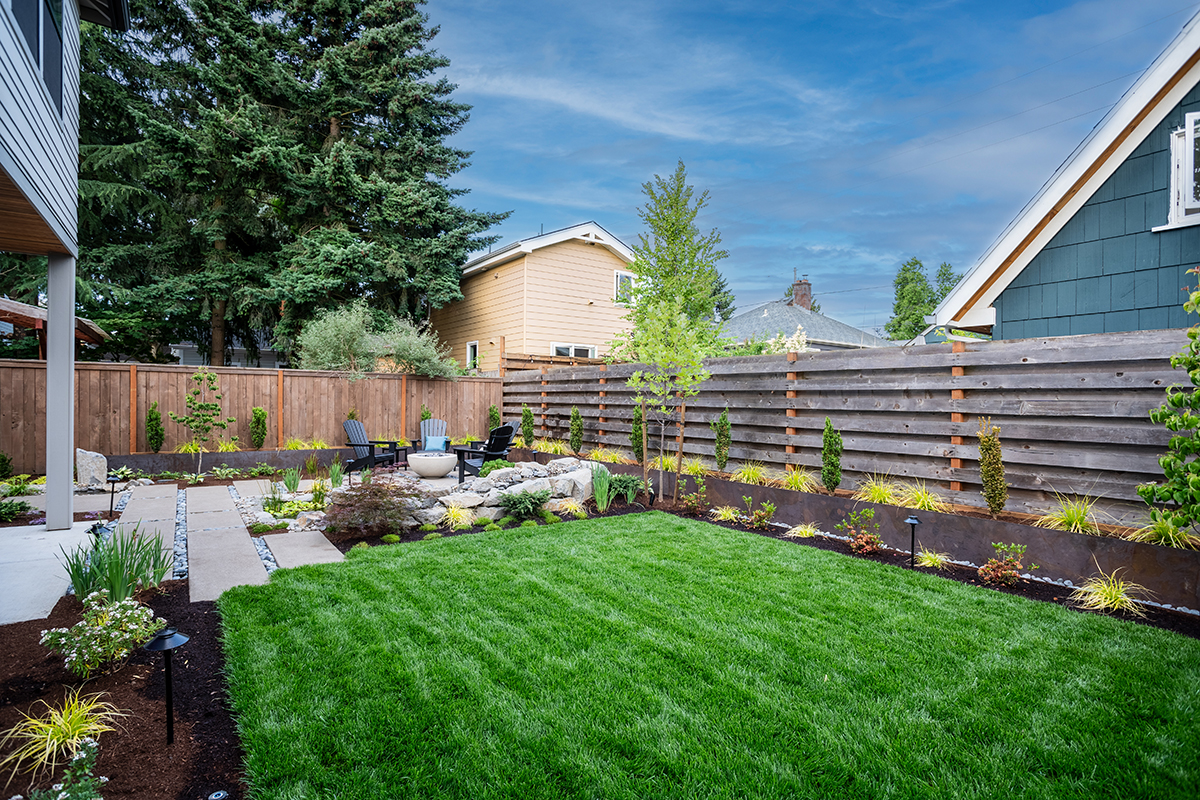 tranquil patio and garden landscape with green lawn fall color